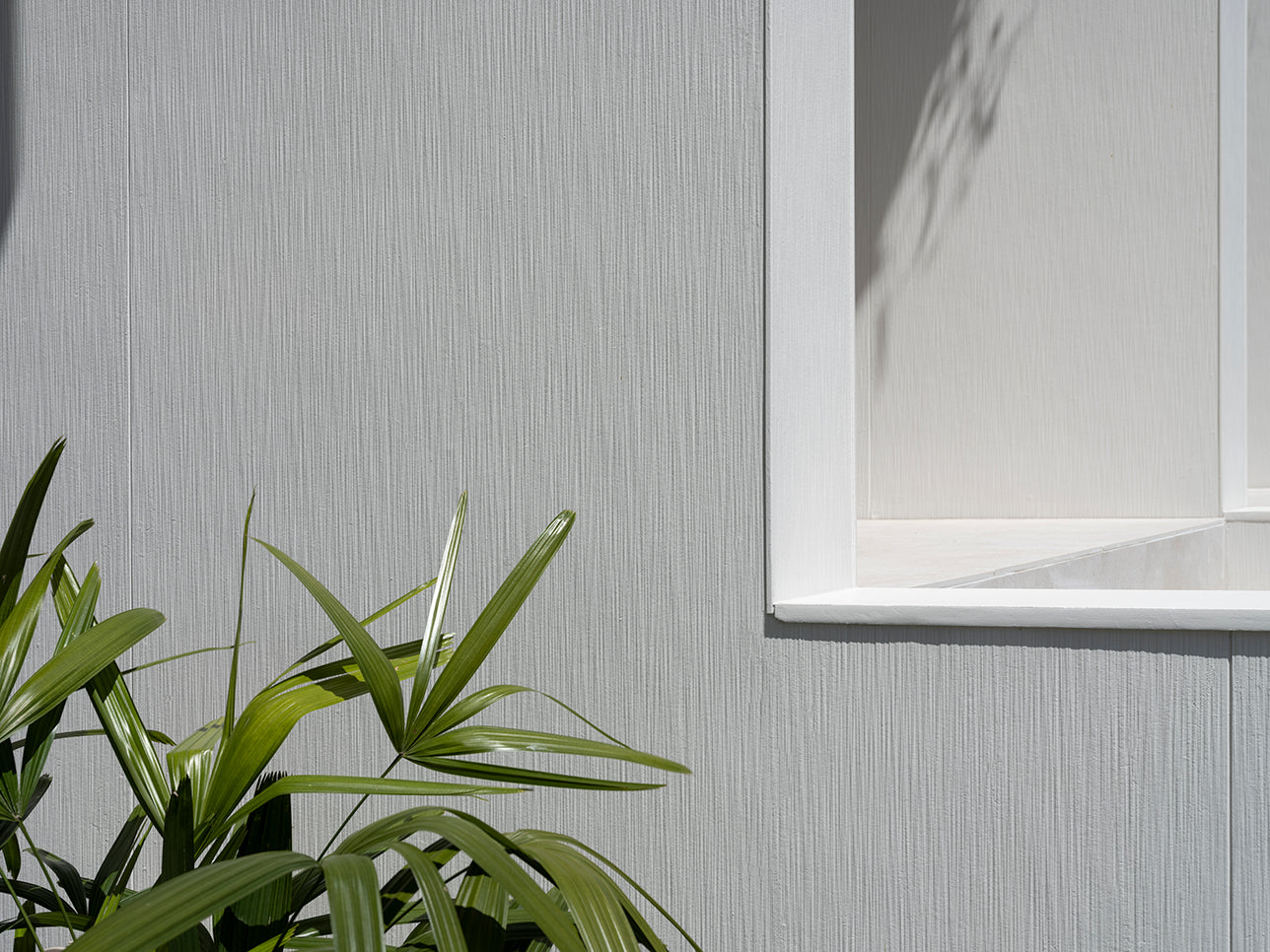 brushed concrete fibre cement light grey with axent trim white 