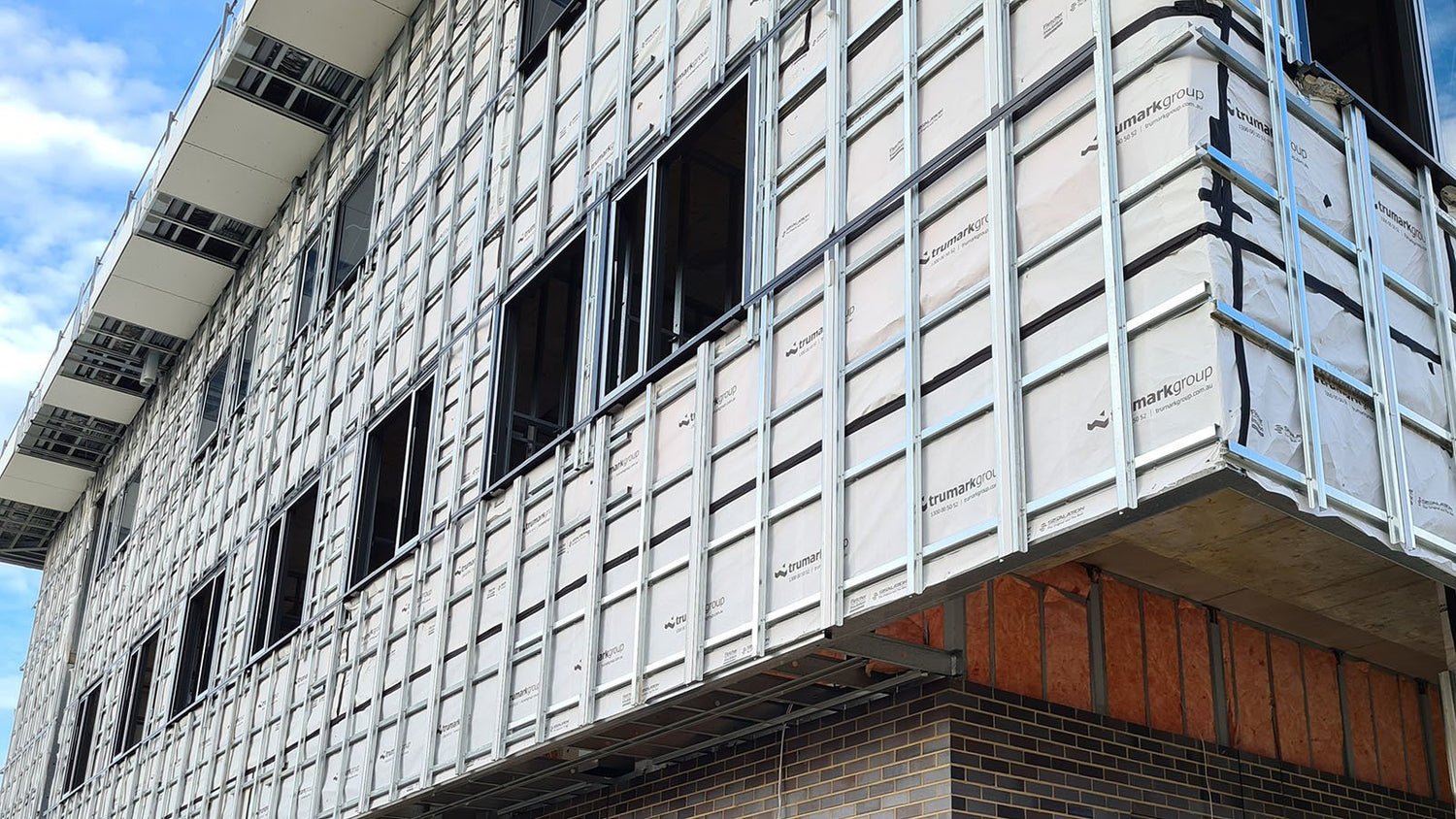 commercial top hat cfc facade installed three storey building